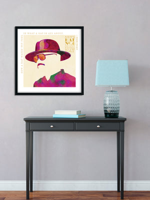 Colorful portrait of a funky fedora hat with a quote from London milliner Philip Treacy — “How a hat makes you feel is what a hat is all about.” Bold graphic shapes in bright colors combined with sophisticated typography and intriguing negative space creates a compelling art piece.