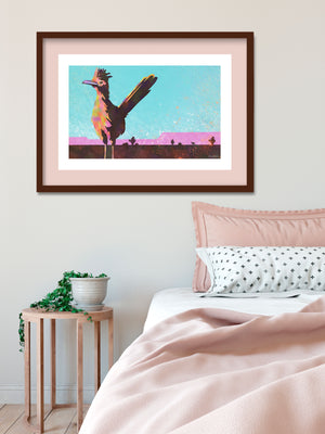 Modern style giclée art print of a roadrunner in West Texas. It features dusty cool background colors, bright warm foreground colors and gritty texture with a minimalist western landscape in the background.