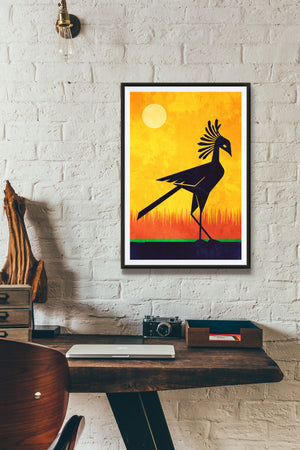 Beautiful primitive art print of an African Secretarybird on the savannah created in a mid-century modern style with bold gold, red, green and black colors.