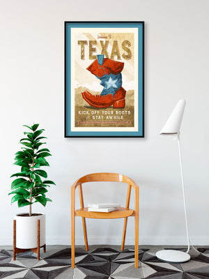 Giclée art print travel poster of Texas with old cowboy boot with flag motif and dusty bluff with farmhouse in background.