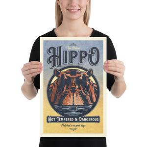 Vintage style humorous African Hippopotamus art print with bold typography and graphics inspired by old travel, and wildlife posters of the 1930s 40s and 50s. Print shows a Hippo rising out of the water surrounded by graphics.  Size 12"x18"