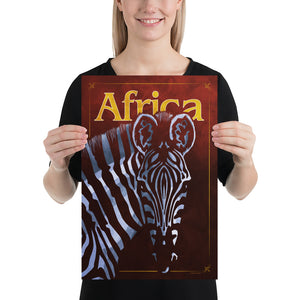Bold graphic giclée art print of an African Zebra. Print shows an African Zebra blending into a dark background and overlapping the word “Africa”. Size 12" x 18"