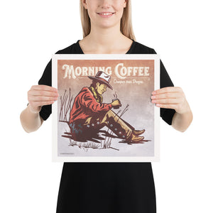 Bold graphic giclée art print of a Cowboy drinking coffee with the words “Morning Coffee”. Print is an ink portrait, with color, of a cowboy seated on the grounded with a cup of coffee in hand.  Size 14" x 14"