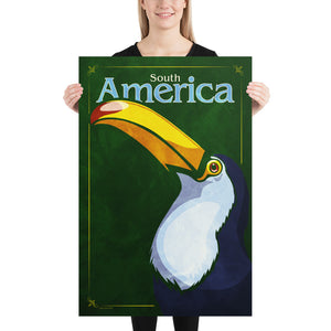 Bold graphic giclée art print of a South American Toucan. Print shows a South American Toucan blending into a dark green background and overlapping the words “South America”. Size of 24" x 36"
