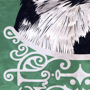 Detail of Bold graphic giclée art print of a Peregrine Falcon. Print is a portrait of a Peregrine Falcon adorning the top of a beautiful graphic ornament on a green background with the words “Peregrine Falcon” below.