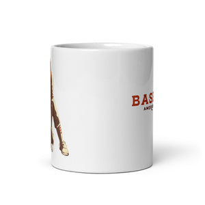 Retro styled ceramic mug with an American Baseball Player catching a ground ball and the words “Baseball. America’s Pastime” printed on one side. 